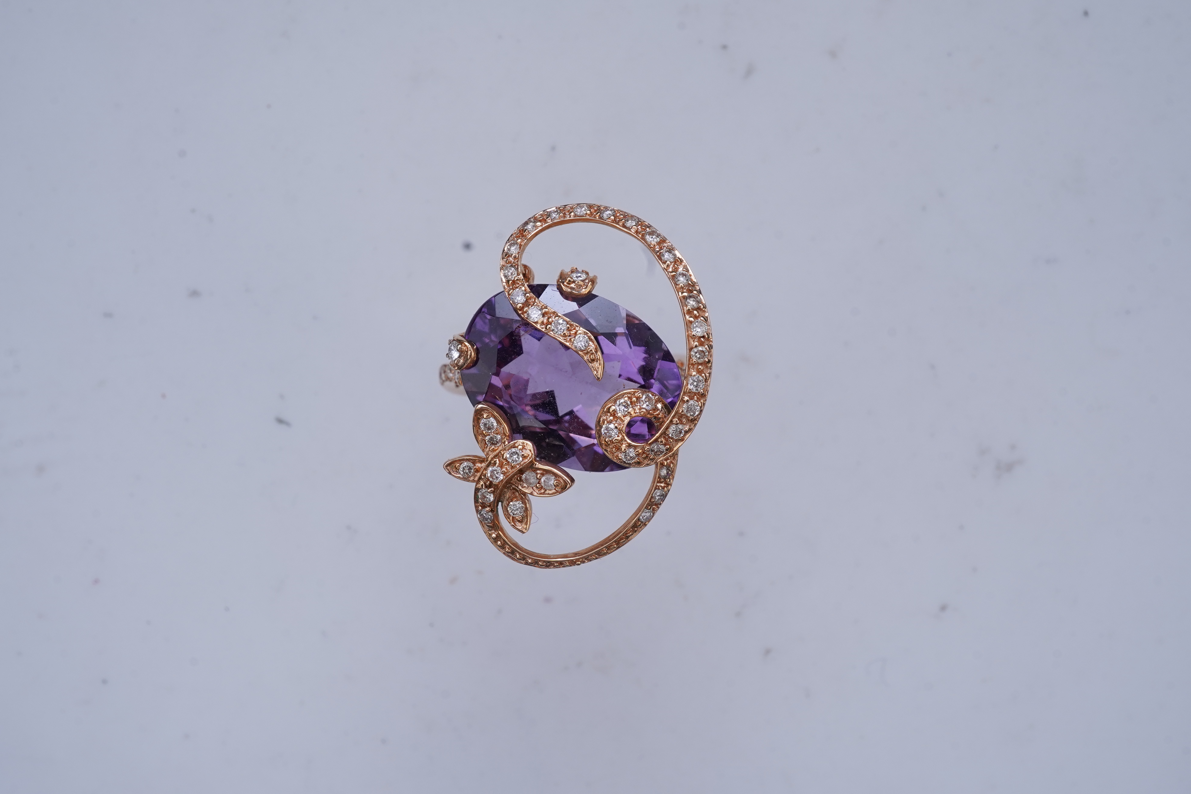 An amethyst and diamond ring